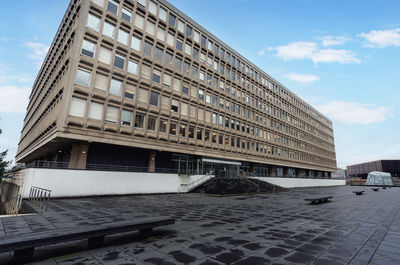 Low angle view of modern buildings against sky