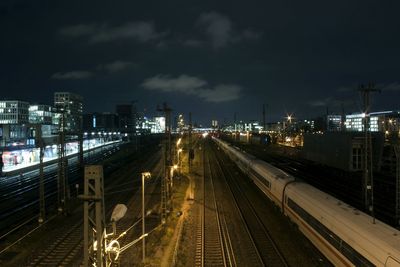 Railroad tracks at night