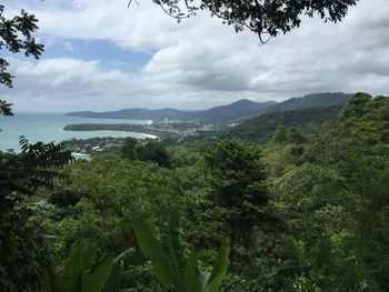 Scenic view of sea against cloudy sky