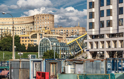 View of buildings against cloudy sky