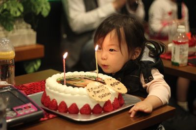 Portrait of woman with chocolate cake