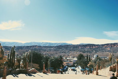 Panoramic view of city against sky during winter