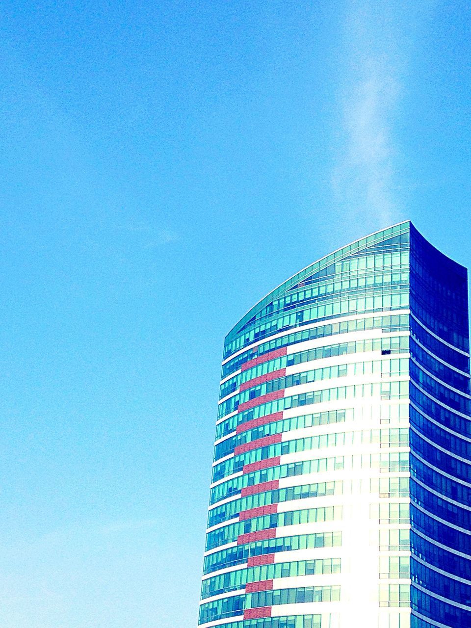 architecture, building exterior, built structure, blue, low angle view, modern, clear sky, office building, city, skyscraper, tall - high, copy space, building, tower, sky, day, outdoors, no people, city life, tall