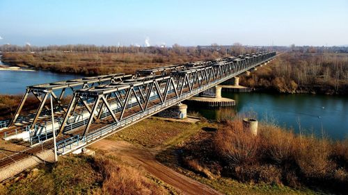 Bridge over river against sky