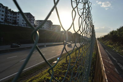 Road in city against sky