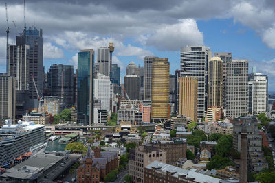 Modern buildings in city against sky