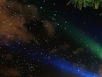 Low angle view of moon against sky at night