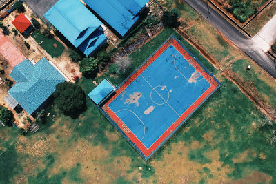 Aerial view of damaged hockey field in city