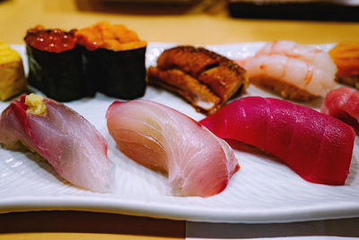 Close-up of sushi served on table
