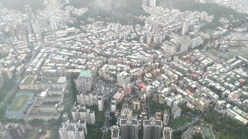 High angle view of modern buildings in city