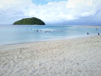 Scenic view of beach against sky