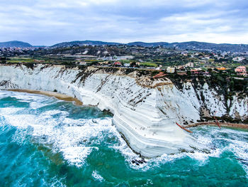 Scenic view of sea against cloudy sky