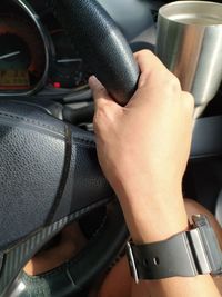 Close-up of man hand holding car