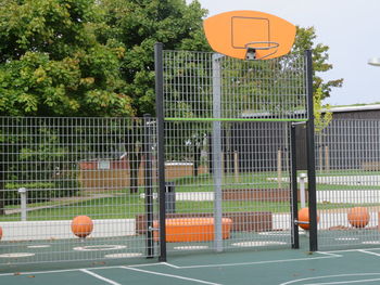 Basketball hoop against trees