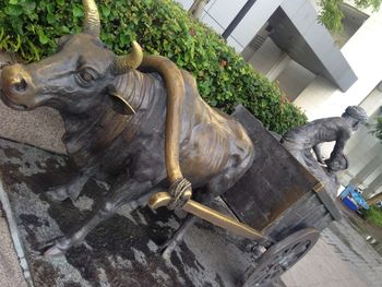 Statues on metal structure