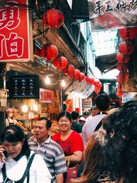 People on street market in city