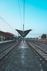 View of railroad station platform against clear sky