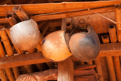 Low angle view of old equipment hanging on ceiling