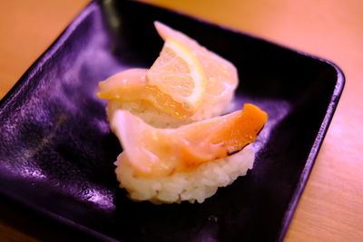 Close-up of sushi in plate on table