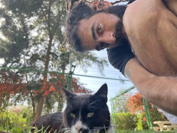 Low angle view of black cat