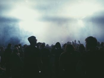 People enjoying music concert