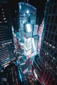 High angle view of illuminated cityscape at night