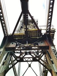 Low angle view of ferris wheel against sky