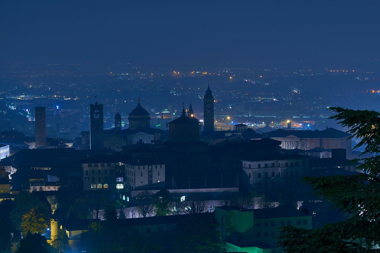 ILLUMINATED BUILDINGS AT NIGHT