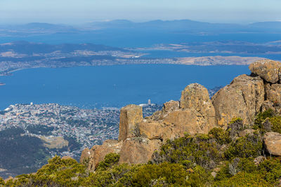 Aerial view of landscape with mountain range in background