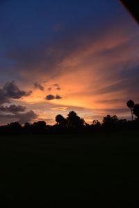 Scenic view of silhouette landscape against sky during sunset