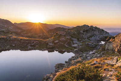 Scenic view of mountains against sky during sunset