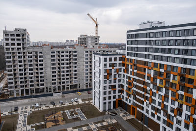 Buildings in city against sky