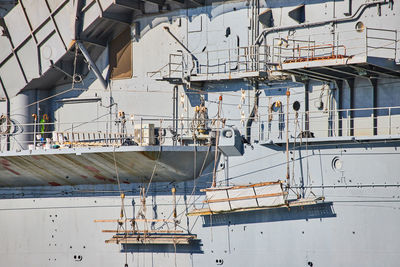 Boats moored at harbor