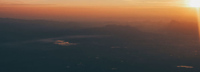 Scenic view of landscape against sky during sunset