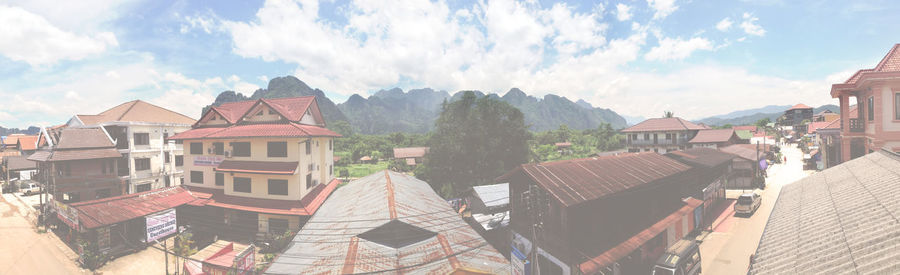 Panoramic view of residential district against sky