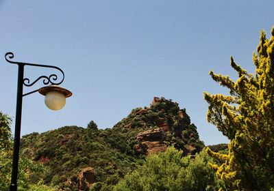 Low angle view of street light against sky