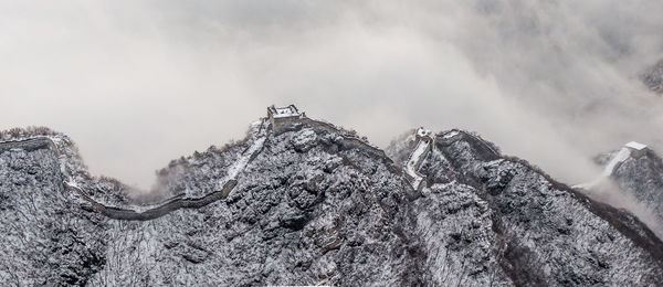 Low angle view of rocks against sky