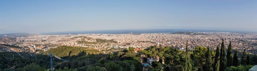 Panoramic shot of cityscape against sky