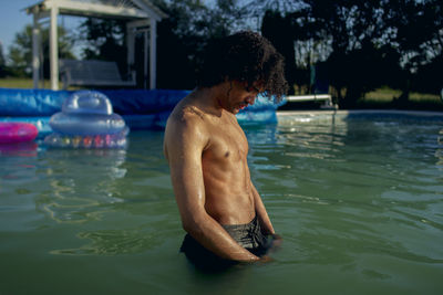 Man swimming in pool