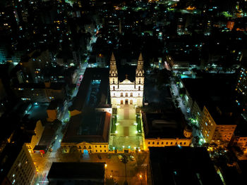 High angle view of illuminated buildings at night