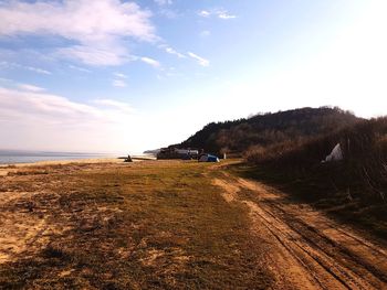 Scenic view of beach against sky