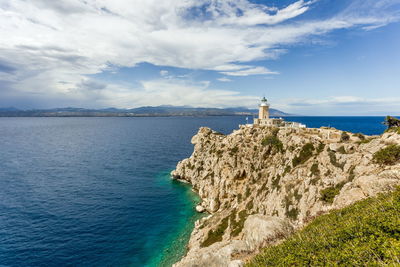 Distant view on melagavi lighthouse near loutraki, greece