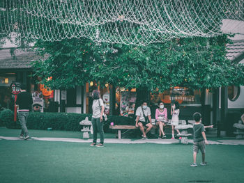 Group of people in front of building