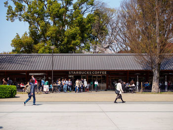 Group of people in front of building