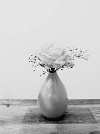 Close-up of rose on table