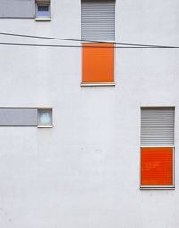 Full frame shot of window on white wall