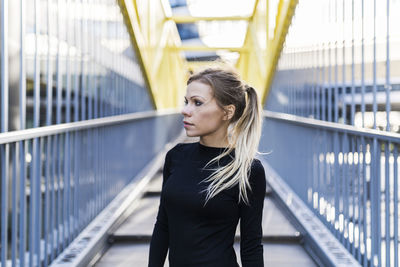 Portrait of woman on bridge