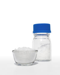 Close-up of drinking glass against white background