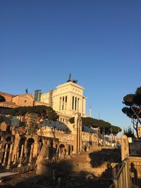 View of historic building against clear blue sky