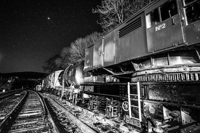 Railroad tracks at night